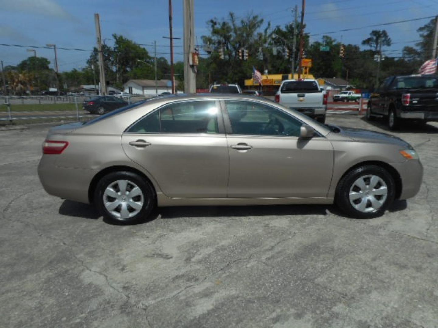 2009 GOLD TOYOTA CAMRY CE; SE; LE; XL (4T1BE46K29U) , located at 10405 Abercorn Street, Savannah, GA, 31419, (912) 921-8965, 31.988262, -81.131760 - Photo#4